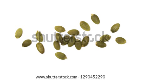 Pumpkin seeds isolated on white background, top view