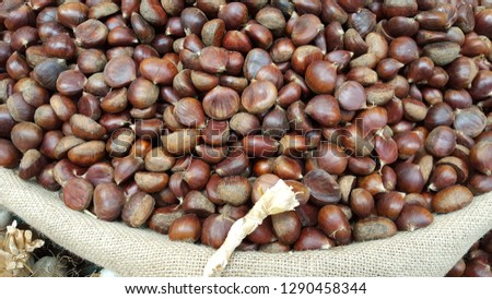 chestnuts lined up for sale in the market