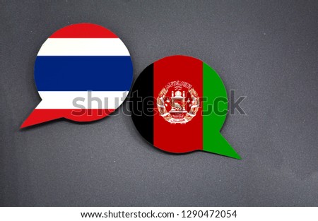 Thailand and Afghanistan flags with two speech bubbles on dark gray background