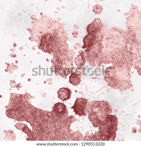 Luxury rose gold and white metal paint splatter effect on watercolor paper background. Pink gold glitter splash texture. Beautiful feminine backdrop.