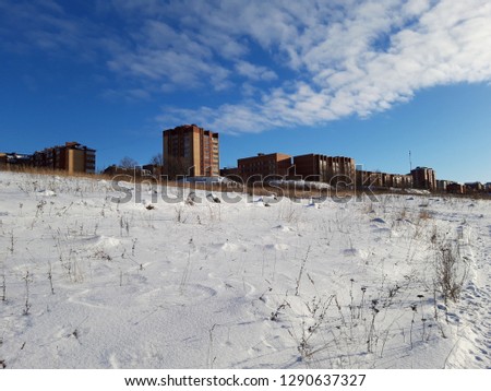 Russian village. Provincial winter town in the suburbs. Documentary photography.