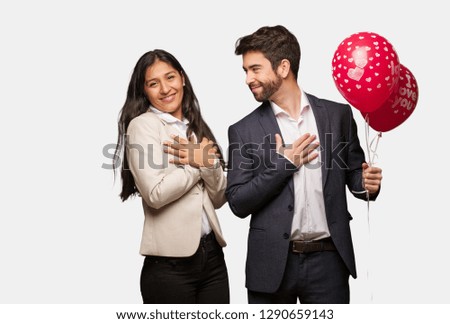 Young couple in valentines day doing a romantic gesture