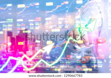 showing the Trading graph over the Abstract blurred photo, Business graph and trade monitor of Investment Futures market, app interface is to trade stocks, currencies. stock broker tool.