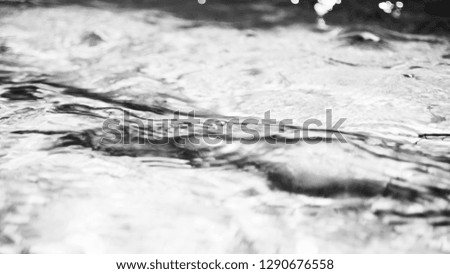 Abstract water image shows unique water movement that can be used for backgrounds or as a picture. black and white