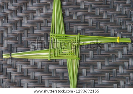 A green St. Brigid's cross, made from rushes, an old Irish tradition, every house used to hang one on the wall in the belief it it ward off any evil.