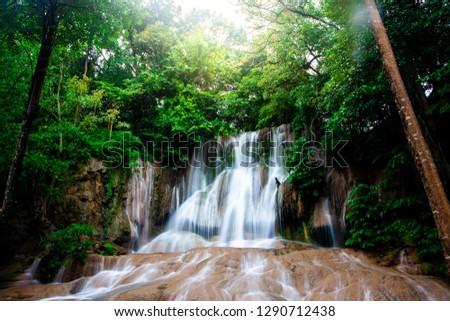 Landscape photo Saiyok Waterfall,Amazing waterfall in wonderful autumn forest, beautiful waterfall in rainforest at Kanchanaburi province, Thailand