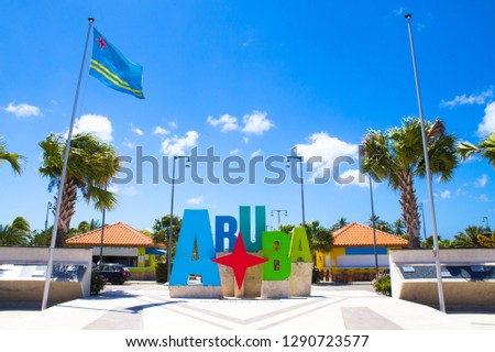 Colorful Aruba welcome sign on a sunny day