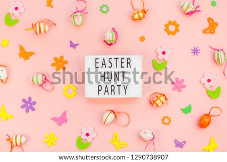 Creative Top view flat lay holiday composition Easter hunt party text on lightbox pink paper background copy space Template Easter day seasonal pattern