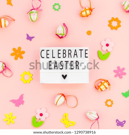 Creative Top view flat lay holiday composition Easter text on lightbox pink paper background copy space Template Easter day seasonal pattern