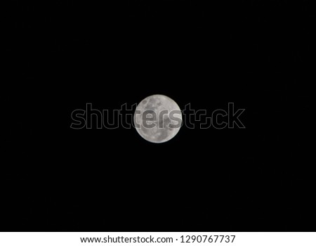 Close up of Full Moon at Dark Night