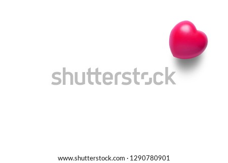 closeup pink heart rubber with shadow for love memorial or romantic on valentine day with wedding and heart health on board or table with white space and background isolated included clipping path