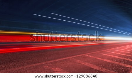 police light trails in tunnel. Art image . Long exposure photo taken in a tunnel