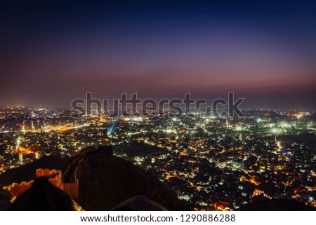  A nightscape of Jaipur city also known as Pink city during sunset from Nahargarh Fort, Rajasthan, India. Royalty-Free Stock Photo #1290886288