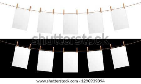 Empty paper sheet hanging on rope, isolated on black and white background, mock up for your project, poster template