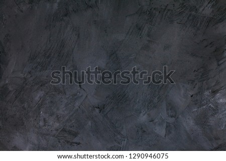 Abstract black background with rough distressed aged texture, grunge charcoal gray color background for vintage style cards or web backgrounds or brochure backdrop for ads or other graphic art images
