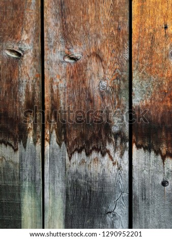 Grungy Wood Background With Water Stained Vertical Planks