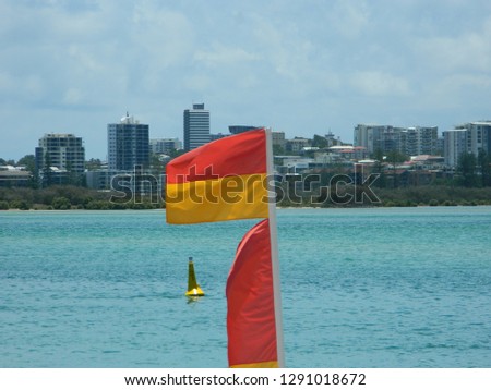 An Australian  surf lifesaving flag at Caloundra, Queensland, Australia
