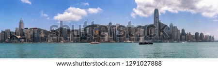 Panoramic view to the iconic urban skyline of Hong Kong during a sunny day