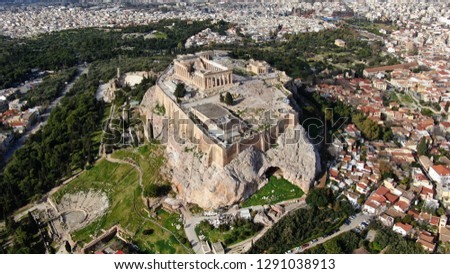 Aerial drone bird's eye view photo of iconic Acropolis hill, the Parthenon and famous theater of Dionysus, Athens historic centre, Attica, Greece