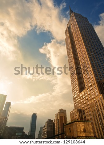 Sunset in New York, Empire State Building Royalty-Free Stock Photo #129108644