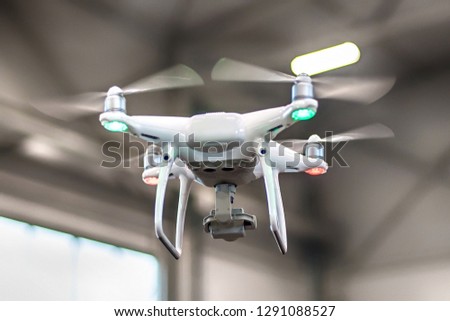 Uav drone copter flying with high resolution digital camera. Close up