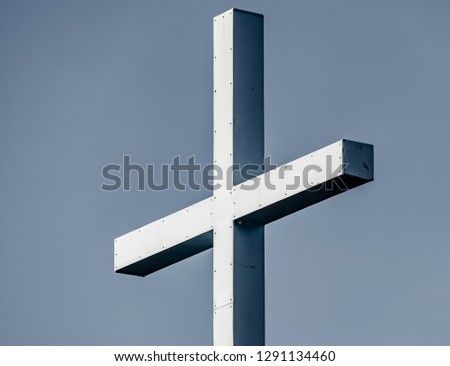 religious cross against clear blue sky
