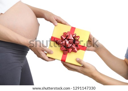 husband giving presents to young pregnant belly wife isolated and white background 