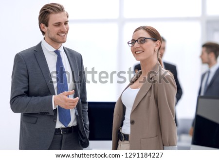 business partners standing in a modern office