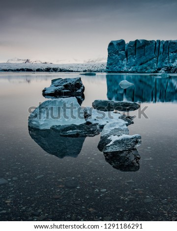 Few ice blocks floating in Glacier Lagoon of Iceland. To calm and beautiful to pass up.