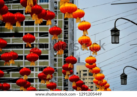 Close up of hanging red and gold traditional Chinese lanterns in Chinatown Singapore to celebrate Chinese New Year 2019, the Year of the Pig