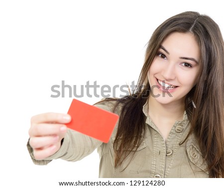 beautiful friendly smiling confident girl showing red card in hand, over white background