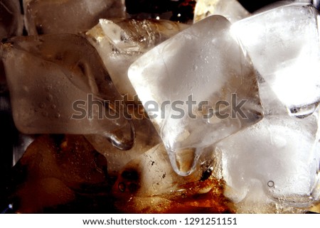 Ice cube with carbonated drink / Carbonated drinks are beverages that contain dissolved carbon dioxide