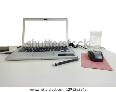Laptop with office desk background