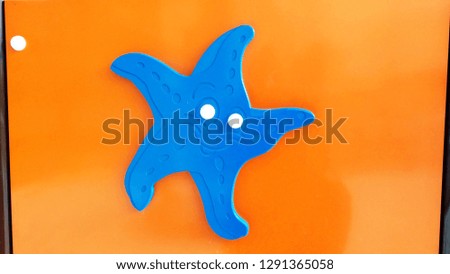 Blue starfish on a playground