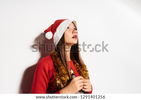 woman in a New Year's costume on a white background