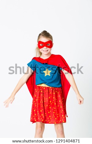 pretty blonde supergirl with red cape
