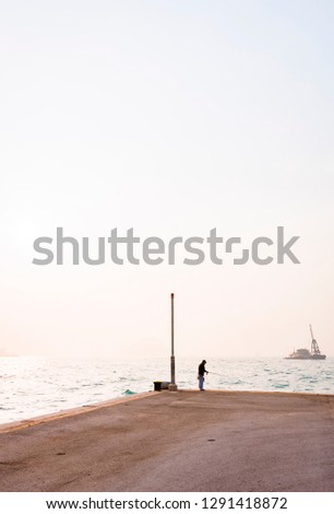 A man fishing at Instagram pier. 2019, Sheung Wan, Hong Kong