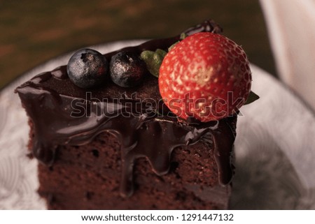 chocolate cake with strawberry and coffee.