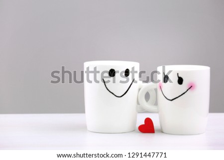 Two white mugs with heart empty space background.Valentine's day card.Romantic couple.Love concept.