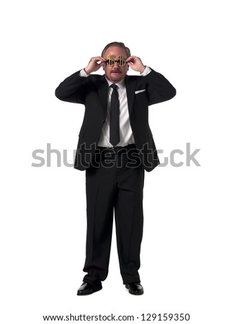 Portrait of a mature businessman with dollar sunglasses standing over white background