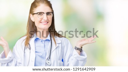 Middle age mature doctor woman wearing medical coat over isolated background Smiling showing both hands open palms, presenting and advertising comparison and balance