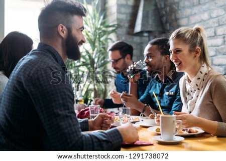 Picture of young business colleagues on break Royalty-Free Stock Photo #1291738072