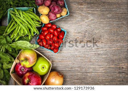 Fresh farmers market fruit and vegetable from above with copy space Royalty-Free Stock Photo #129173936