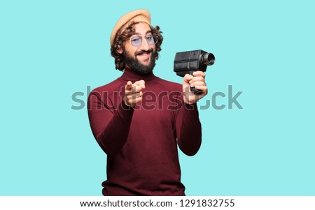 French artist with a beret and vintage movie camera