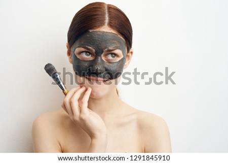 woman in cosmetic mask care