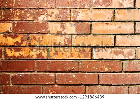 Grunge peeling paint brown brick wall texture
