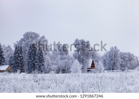 View of the outskirts of the village after a snowfall.