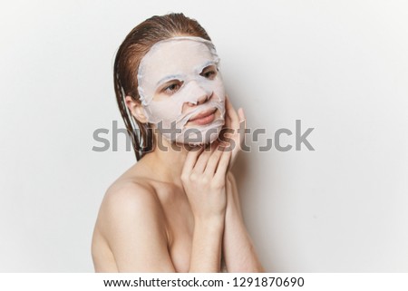  woman in cosmetic mask care                              