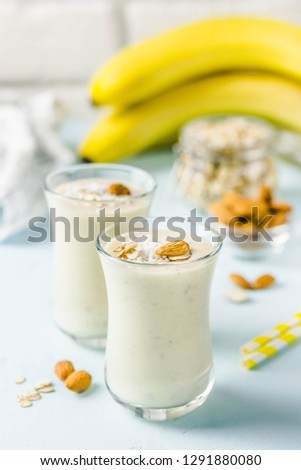 Vanilla spiced breakfast smoothie with coconut flakes. Selective focus, space for text.