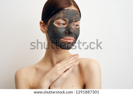 woman in a beauty mask